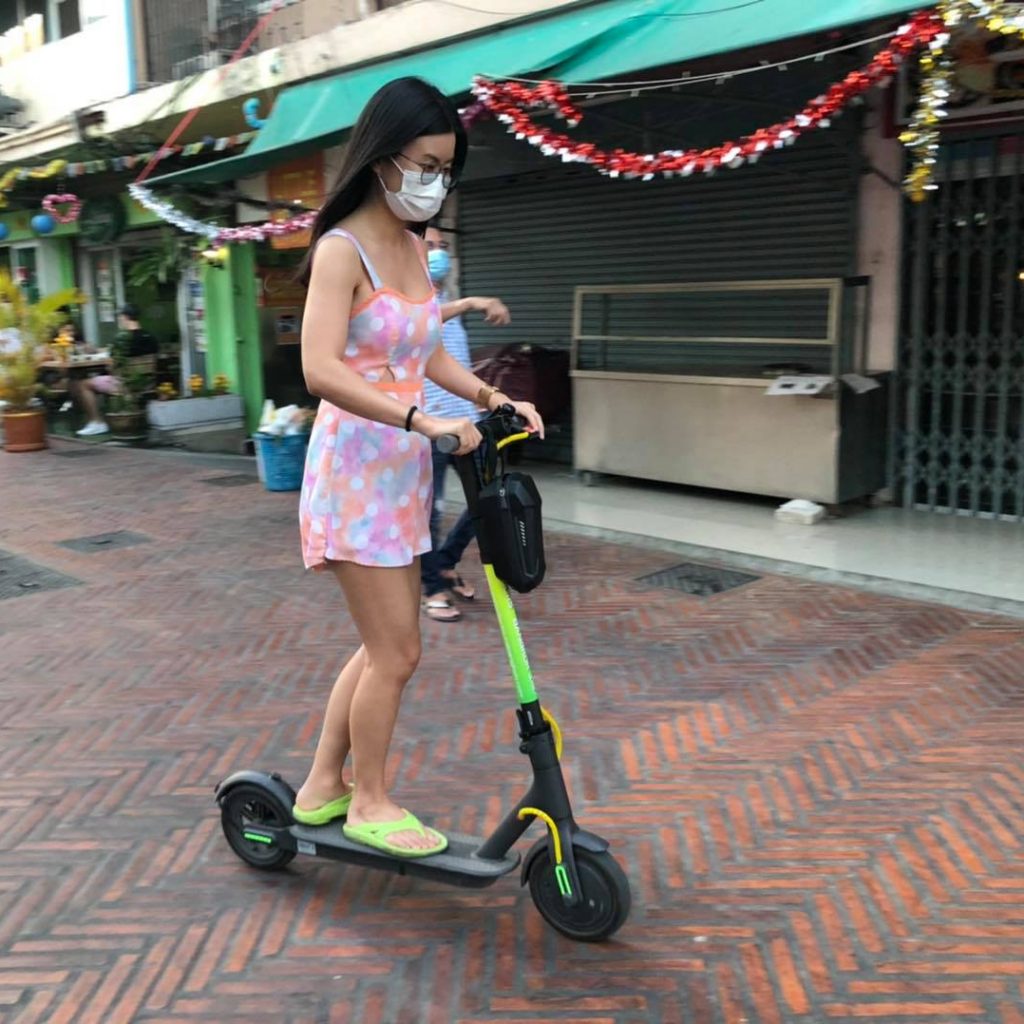 Girl riding a scooter