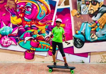 Skateboard with Street Art in the background