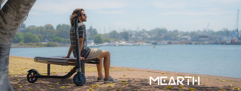 Mearth Scooter with Man on Bench